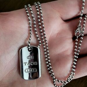 Tiff & Co. Dog tag style necklace